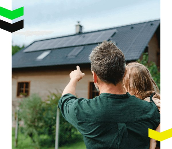 A couple observing a newly installed rooftop solar panel on the rooftop of a house in Chicago, IL.