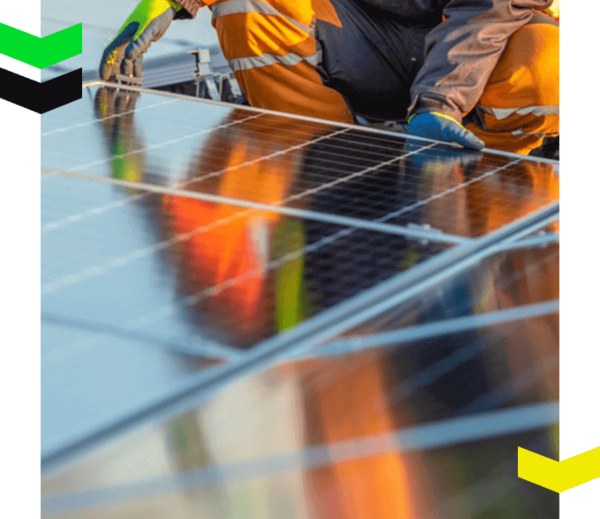 Ongoing solar construction project with workers installing panels in Chicago, IL.